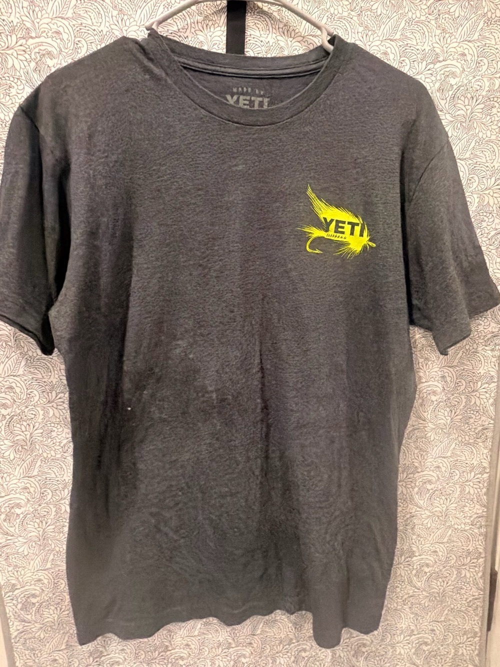 Yeti Black Short Sleeve Tee with Yellow Fly Logo